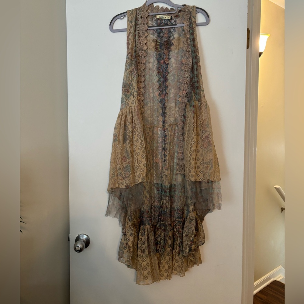 Sleeveless cardigan! Cute as layering or over a tank!